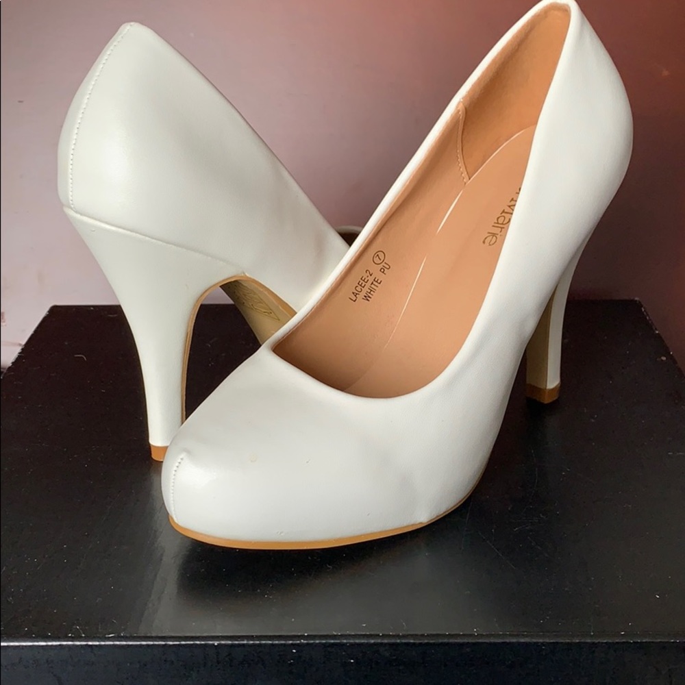 Brand new White pumps